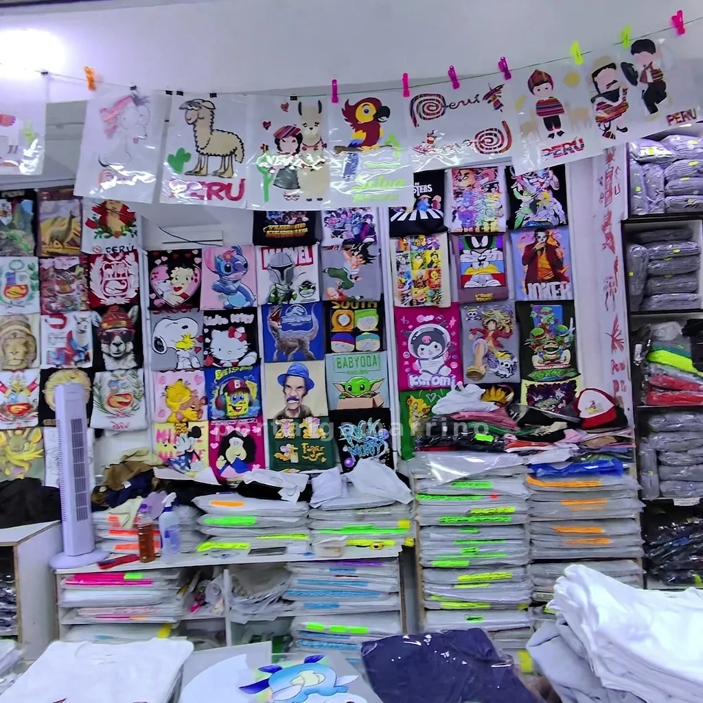 Tienda de polos estampados y transfer personalizados · Estampado Textil · Personalización y sublimación — foto 1